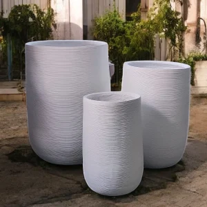 White Fiber cement Round Planter Set with a textured finish and rounded design, featuring three planters of varying sizes, perfect for modern indoor and outdoor decor.